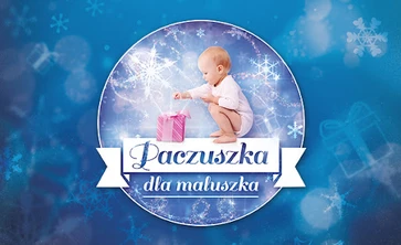 na zdjęciu dziecko w kółku z gwiazdkami i z prezentem